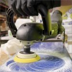 Close-up Alpha BMP-700 Brushless Variable Speed Rotary Polisher polishing a flat surface