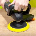 Alpha BMP-700 Brushless Variable Speed Rotary Polisher operating with a large polishing pad