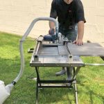 Worker operating Alpha Dry Porcelain Paver Tile Cutting System on an outdoor worksite