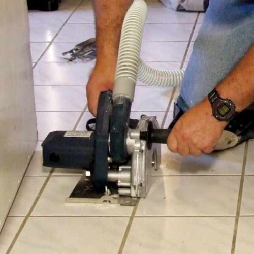 Alpha ECC-125 Ecocutter used for grout removal between floor tiles