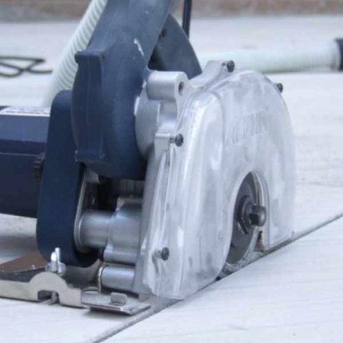 Close-up showing Alpha ECC-125 Ecocutter blade positioned on tile