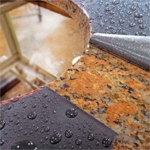 Alpha Surface Protection Tape covering wet stone surfaces around a sink opening