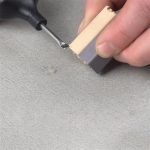 Mechanic TileRepairKit used to repair a damaged ceramic tile