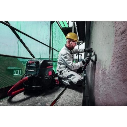 Worker using Metabo ASR 35 AutoCleanPlus All-Purpose Vacuum Cleaner for dust collection
