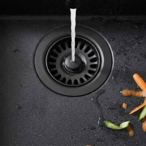Basket Strainer Chocolate installed in a kitchen sink in use