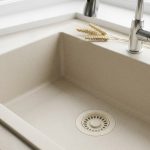 Wheat disposal flange installed in a sink basin
