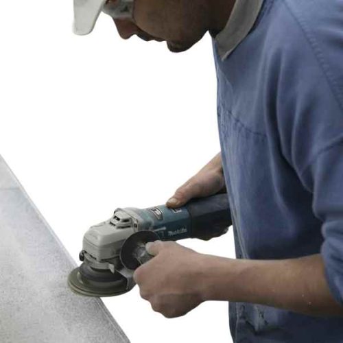Makita 4-1/2" SJS High Power Angle Grinder 9564CV in use