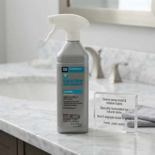 StoneTech Mold & Mildew Stain Remover for Natural Stone 24 oz Sprayer applied to a natural stone shower surface