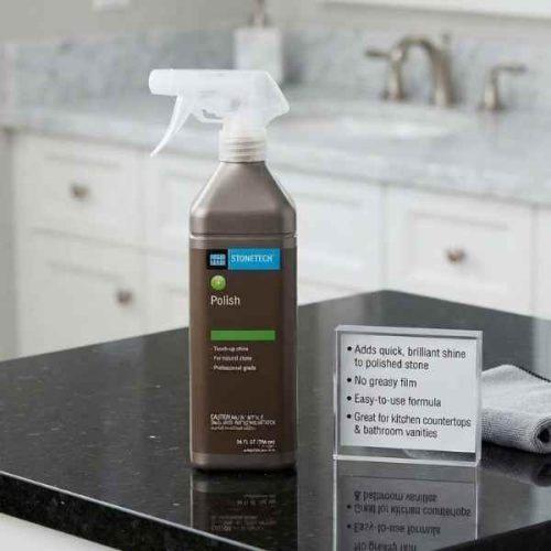 StoneTech Polish 24 oz Sprayer applied to a polished stone countertop