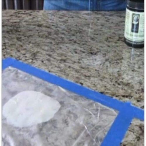 Tenax Lustro Italiano Rust Remover applied to a rust-stained stone surface