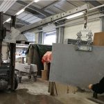 Weha R400 Twin Scissor Lifter in use handling a stone slab