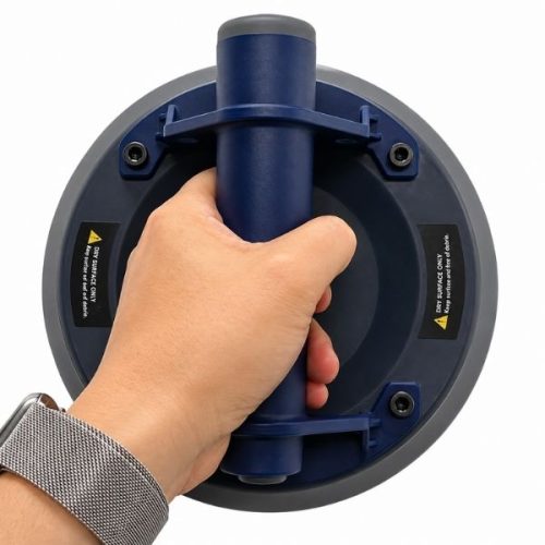 Worker using Weha 8" TuffCup Electric Battery Powered Cordless Vacuum Suction Cup to handle sheet material